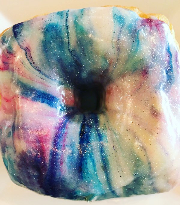 Galaxy Doughnut for you Stargazers out there!!! ☀️☀️☀️☀️☀️☀️☀️☀️☀️☀️☀️☀️☀️☀️☀️☀️☀️☀️☀️☀️ @bellekitchenokc #doughnut #glitter #galaxy #eclipse2017 #doughnuts #donut #donuts #okc #fresh #real #handmade #visitokc #instafood #instagood #food #eat